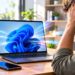 Frustrated Man Facing Laptop Startup Swirl
